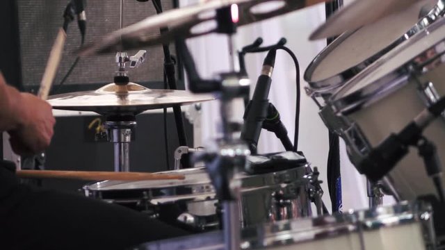 Musician performing on drums on festival
