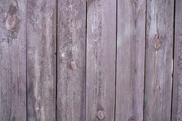 Old wooden fence with peeling paint