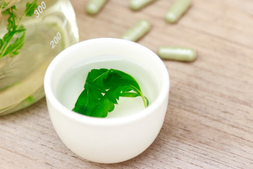 Cannabis oil with medicine capsules for healthy drinking and eating