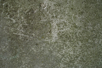 Detail of a gray wall close up. Cinderblock garage, detailing the outside of the garage wall