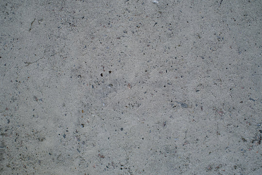 Detail Of A Gray Wall Close Up. Cinderblock Garage, Detailing The Outside Of The Garage Wall