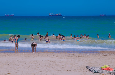 Children camp on the beach in summer