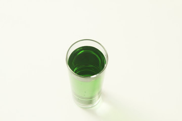 One glass of green liquid on white background, São Paulo, Brazil