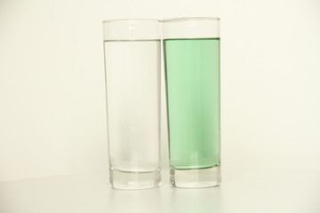 Two glasses of green liquid on white background, São Paulo, Brazil