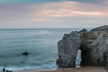 Fototapeta premium view of arch on sunset background in Quiberon - Britain - France