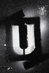 Letter U grunge spray paninted stencil font