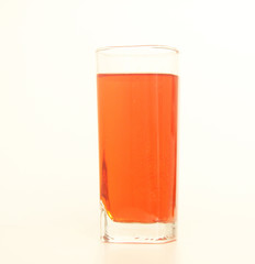 One glass of red and transparent liquid on white background, São Paulo, Brazil