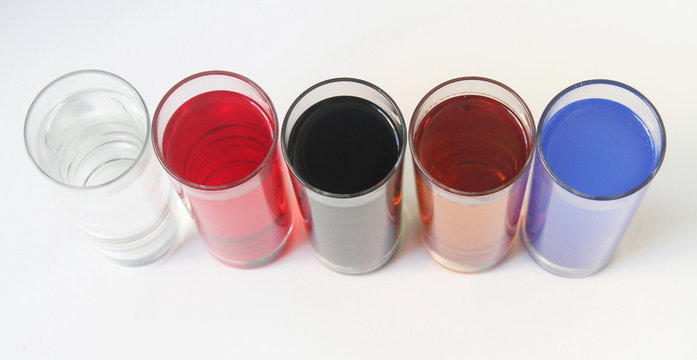 Five Glasses of multicoloured liquid on white background, S&atilde;o Paulo, Brazil
