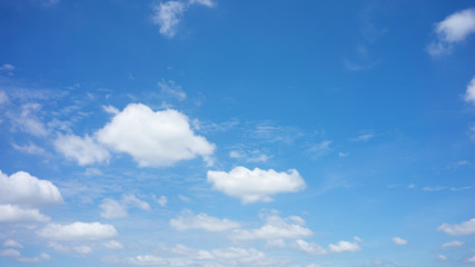 Fototapeta premium The sky is bright blue. There are clouds floating through. Feel relax when looking. See the sun on the sun.