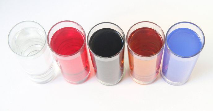 Five Glasses of multicoloured liquid on white background, S&atilde;o Paulo, Brazil
