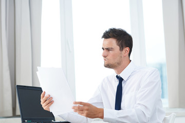 Fototapeta premium businessman working on laptop in office