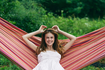 beautiful woman on green leaves park nature