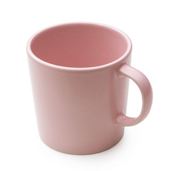 Empty pink ceramic mug isolated on white.