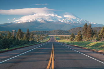 Road towards Mounts Shasta and Shastina in California, United States Highway 97 in Northern California heading South toward a mountain called Shasta volcano, USA © Michal