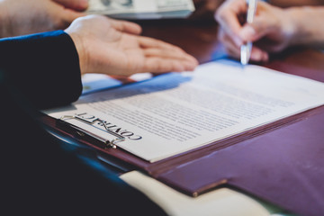 businessman working on negotiation to sign contract with partners