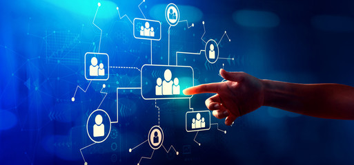 Social connections theme with hand pressing a button on a technology screen