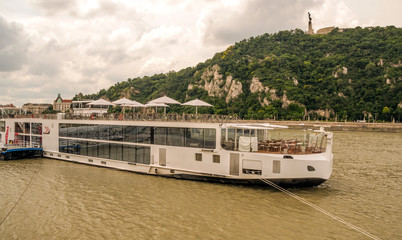 Ship in the Danubio river in Budapest in a cloudy day.