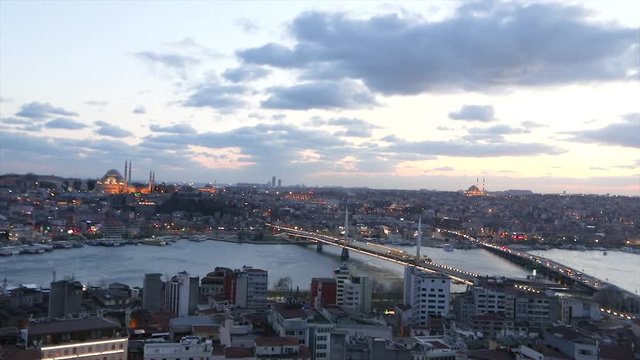 Bridge over the Golden Horn. Ataturk Bridge and Golden Horn Bridge in the evening