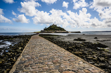 Fototapeta na wymiar St Michaels Mount with Blue Sky and Clouds in Cornwall, England