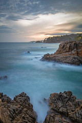Beautiful sunset light in Costa Brava of Spain, near town Palamos, long exposure picture