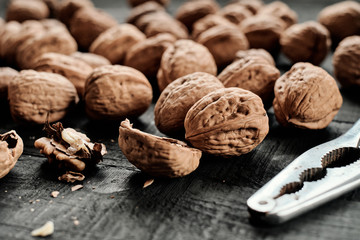 Walnuts on black table