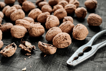 Walnuts on black table
