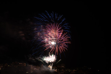 Firework celebrating Bastille Day in Biarritz city. Basque Country of France.