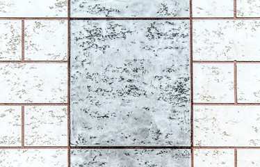 Wall of gray artificial stone as background