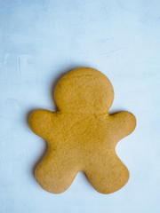 Christmas cookies isolated on light blue background. Christmas baking. Making gingerbread christmas cookies. Christmas concept.
