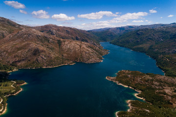 Aerial scenic view of the lake at the Vilarinho das Furnas Dam, Peneda Geres National Park, in Portugal.