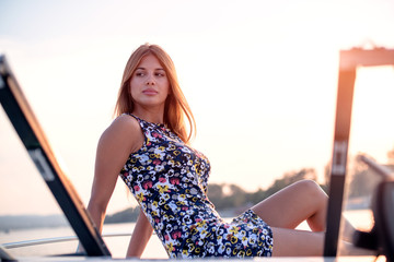 Girl on a front deck of a yacht