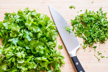 Parsley (Petroselinum crispum) as a herb in the kitchen © kojin_nikon