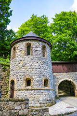 Fototapeta premium Miskolc, Hungary, May 20, 2019: Entrance gates to the Palota Castle Hotel in Lillafured Miskolc.