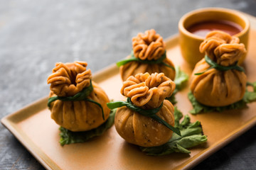 Crispy Potli Samosa or veg money bags are delicious Indian snacks of spiced aloo and mix veggies Or Meat/kheema  stuffed in flaky dough. It's a great creative starter or appetiser. served with ketchup