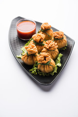 Crispy Potli Samosa or veg money bags are delicious Indian snacks of spiced aloo and mix veggies Or Meat/kheema  stuffed in flaky dough. It's a great creative starter or appetiser. served with ketchup
