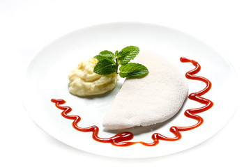 Delicious sweet tapioca with vanilla mousse, guava syrup and mint leaf on white background.