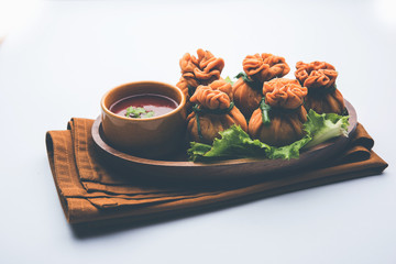 Crispy Potli Samosa or veg money bags are delicious Indian snacks of spiced aloo and mix veggies Or Meat/kheema  stuffed in flaky dough. It's a great creative starter or appetiser. served with ketchup