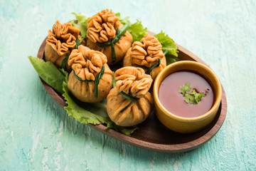 Crispy Potli Samosa or veg money bags are delicious Indian snacks of spiced aloo and mix veggies Or Meat/kheema  stuffed in flaky dough. It's a great creative starter or appetiser. served with ketchup