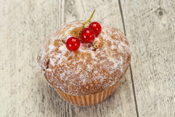 Sweet tasty muffin with red currants