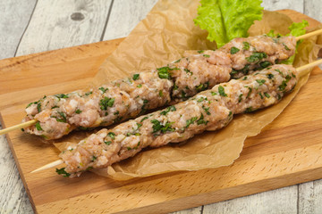 Raw minced pork skewer kebab for grill