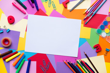 Various school accessories on colorful background with copy space. Concept back to school.