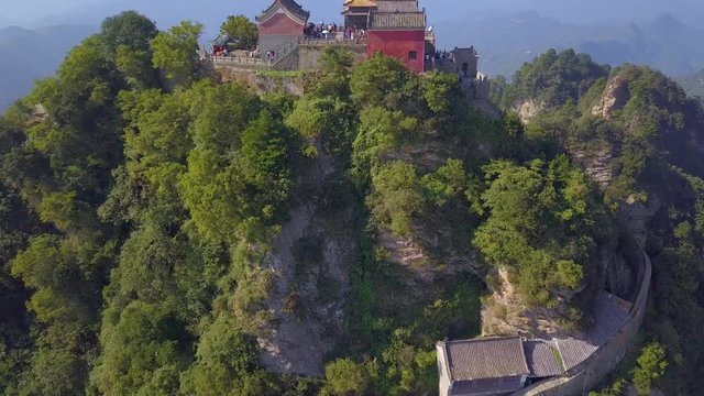 Aerial view to Wudang Mountain is famous for Taoism and Taihe Palace (the Golden Palace)  built on the absolute top of Tianzhu Peak. Wudangshan, Hubei province, China