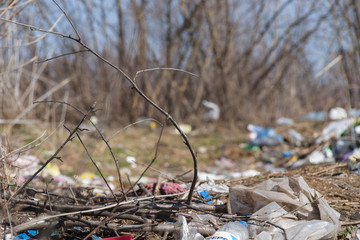 Trash on the agriculture field. Ecology problem and big harm to nature.
