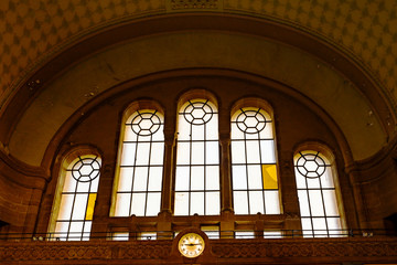 Fototapeta premium leaded windows and clock in train station Gare De Metz Ville. Metz. France