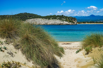 Voidokilia Beach, popular white sand and blue clear water beach in Messinia in Mediterranean area in shape of Greek letter omega, Peloponnese, Greece.