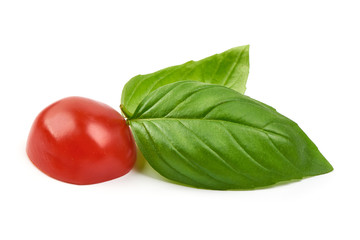 Fresh basil leaves with cherry tomato, close-up, isolated on white background