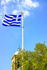 National symbol of Greece, blue-white greek flag and blue sky, copy space