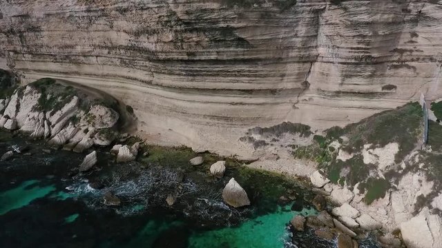Aerial view of the medieval town of Bonifacio on a steep cliff by the sea