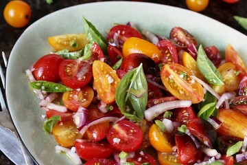 cherry tomato salad with basil and red onion, large sea salt and olive oil