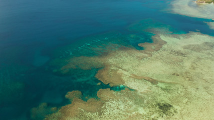 Aerial view lagoon with coral reef, atoll and turquoise water. Busuanga, Palawan, Philippines. Seascape island and clear blue water tropical landscape